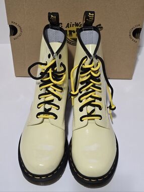 Dr. Martens 1460 Women's Patent Leather Lace Up Boots in the color Toile Cream